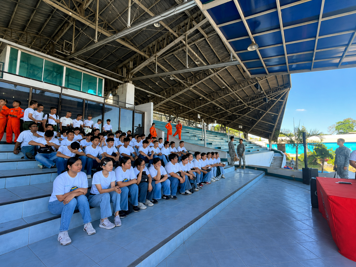 Lacson College criminology students gathered in a covered court for a school activity